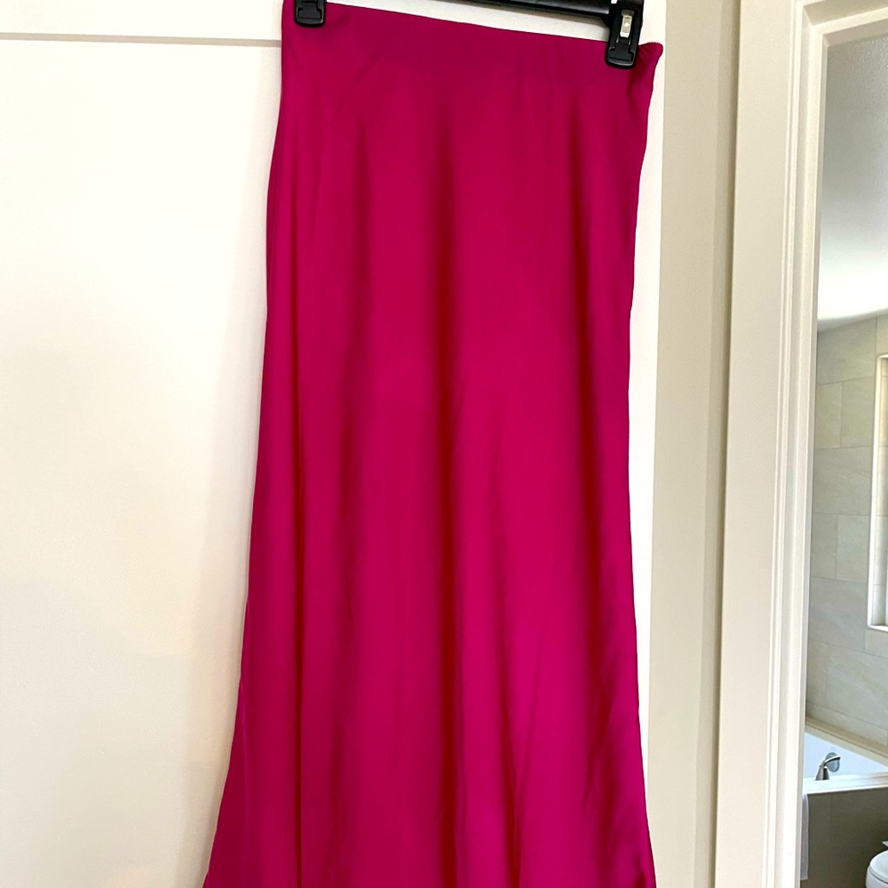 Fuchsia midi skirt . Never worn but no tags!